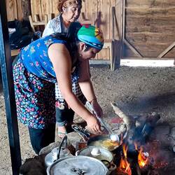 Frying the potato cakes (mashed potato mixed with a bit of wheat flour)