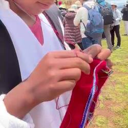 This boy is 14 and improving his weave. (He also needs to clean his nails 😉)