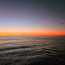 Sunset with Venus over calm seas