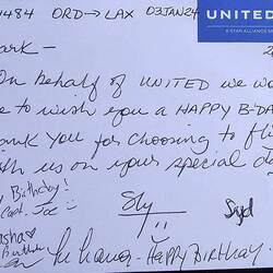The back of the voucher was signed by the crew members. Nice touch!