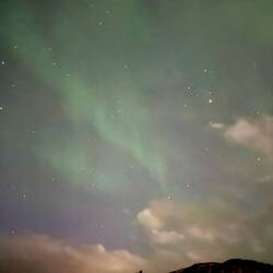 The aurora above Ron & Shannon's lighthouse cabin