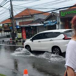 Traffic is slowed by the flooding on the roads.