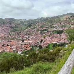 Cusco lies between mountains