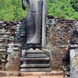 Buddha statue at Velgam Vehera, an ancient Buddhist temple complex in Sri Lanka.
