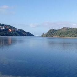 The "mouth" in the distance where river meets sea