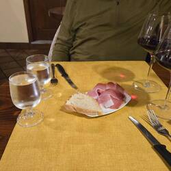 Prosciutto with bread, water, wine