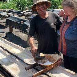 The salt is dried by tge sun and sifted by hand.