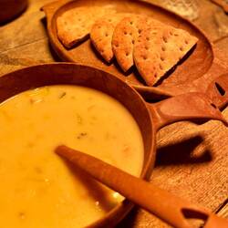 A warm drink, fish soup and traditional polar bread