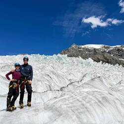 Wrapping up our ice walk and waiting for our helicopter. What a day!