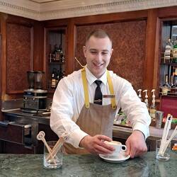 Find a smiling crew member.