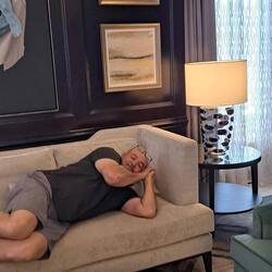 Teammember sleeping in the lounge.