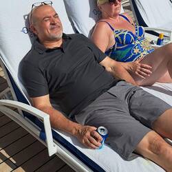 Teammember sleeping on deck.