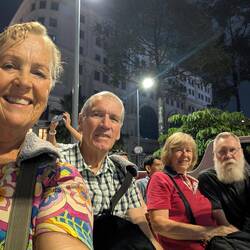 On the sightseeing bus at night