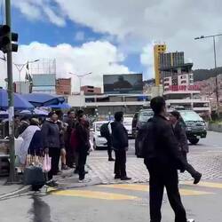 The traffic is insane. The vans in this video are private buses that most people use to get around.