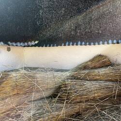 Corrugated iron edge in this case is to stop the cows eating the thatch