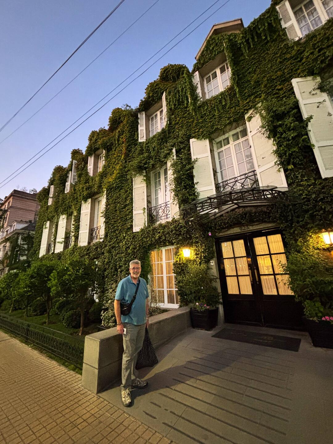 Brad in front of our charming Ivy covered hotel