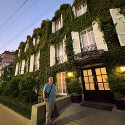 Brad in front of our charming Ivy covered hotel