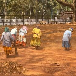 Women sweeping the dirt, an endless task!