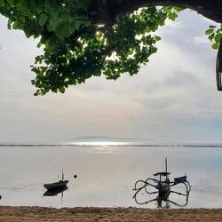 The sun was glistening off the placid water this morning in Sanur!