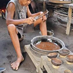 Notice the strength and shape of his feet from climbing palm trees all his life!