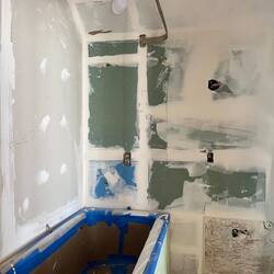 Custom shower rod will ad architectural interest to the bath.