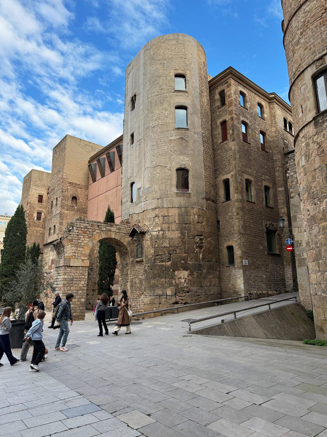Barcelona’s Roman aqueduct remains are visible near Plaça Nova, integrated into medieval buildings.