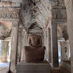 Beheaded Buddhist statue (Hindus did this to most Buddhist statues)