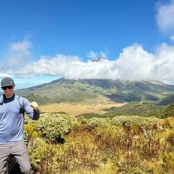 Chris so happy for a view of Mt Taranaki after waiting almost two hours for the clouds to clear