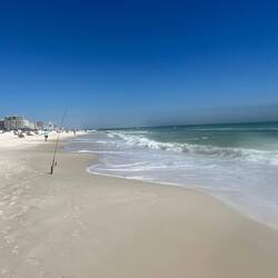 Surf fishing along the beach.