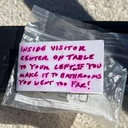 Note inside the geocache key holder I saw while sitting outside the welcome center