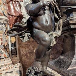 Inside St. John's Cathedral in Valletta, Malta. A baby angel crushing the skull of an Ottoman Turk.