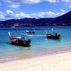 We landed on the beach at Patong and summoned a ride from Grab, Phuket's answer to Uber