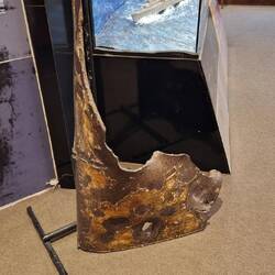 Part of the 10mm thick hull of the Graf Spee, with a sizeable hole from incoming munitions.