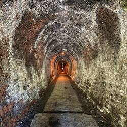 Tunnel shot with natural lighting near the opening