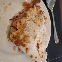 A sort of breakfast omelette, but no eggs, the outside was powdered tapioca cooked in a pan.