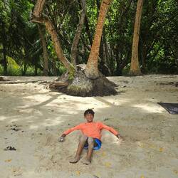 If you didn't bring a beach chair, make one out of sand!