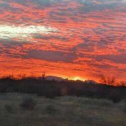 I captured a couple of beautiful sunsets on the way home.