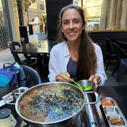 Chelsea is faking this smile. The kimchi soup was waaay to hot for her