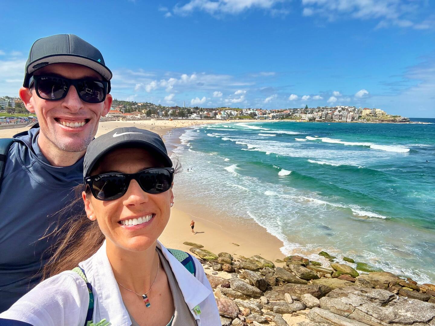 Excited for our beach walk! Bondi beach behind us