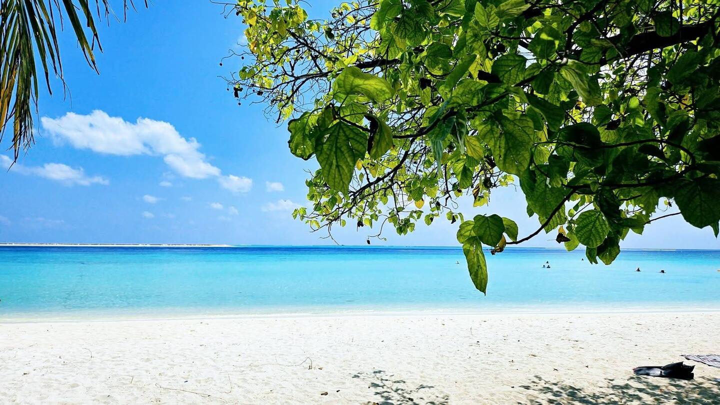 Our beach spot on Gulhi Island. The good snorkeling was out there where the deep blue water is.