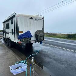 Water fill up in the pouring rain