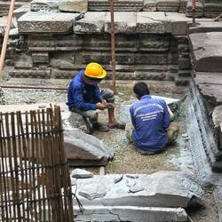 Indian stonies assisting the restorations.