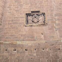 The crest on a monastery that is built on the site of a miracle from 1042.