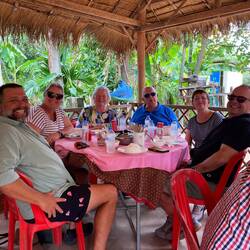 Little relief from the sun at lunch - Khnar Pou Village.