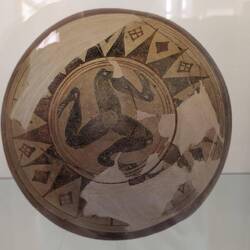 A triskeles on 3,000 year old pottery. It's the symbol of Sicily and it's on their flag.