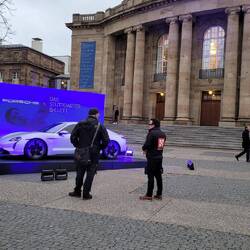 Porsche in front of a ballet theatre