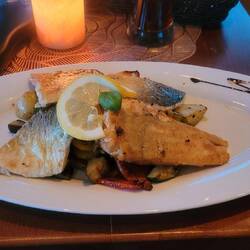 Grilled 4 types of 'fiske', over a variety of vegetables.