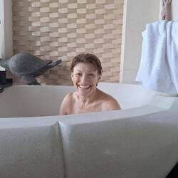 The giants at the Danang resort let Sue sit in their bath for a size perspective