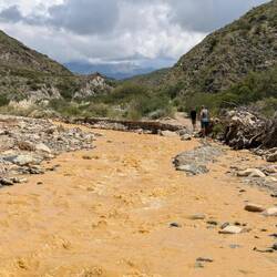 The orange/red/brown colour comes from (probably) ironsalts