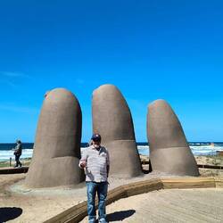 Finger statue in the sand